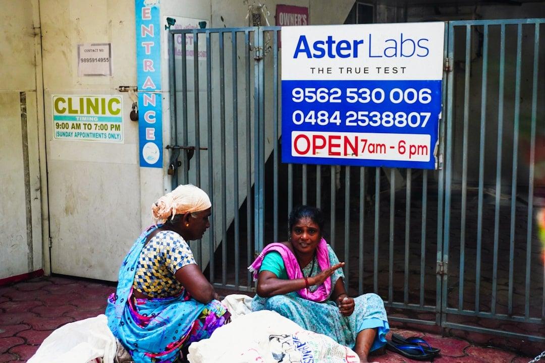 Healthcare worker checking on a patient in a community clinic